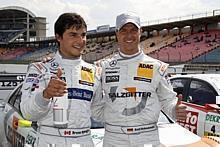 Sieger Bruno Spengler (links) und Teamkollege Ralf Schumacher (AMG Mercedes C-Klasse), der als Dritter zum ersten Mal in der DTM auf dem Podium steht. Foto: MB/Auto-Reporter.NET